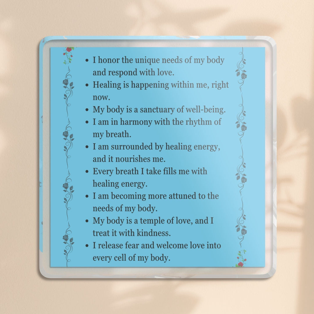 Sea Dragon Dreams healing affirmation acrylic plaque with body-positive quotes and delicate floral accents on light blue.