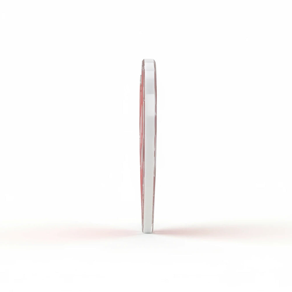 Sea Dragon Dreams heart-shaped acrylic statue side view showing thick, smooth-cut edges and reflective finish
