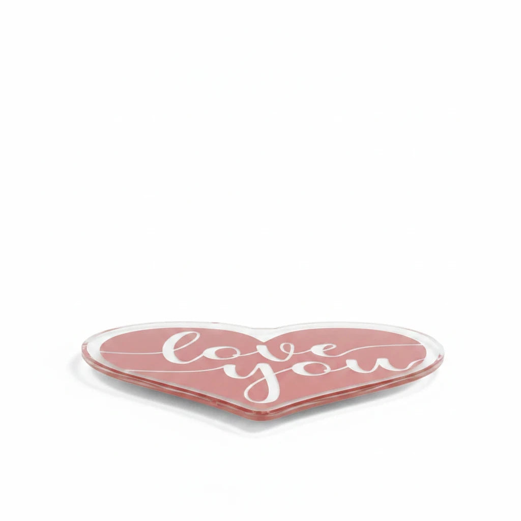 Sea Dragon Dreams heart-shaped acrylic statue with Love You text in a glossy pink mirror-backed finish.