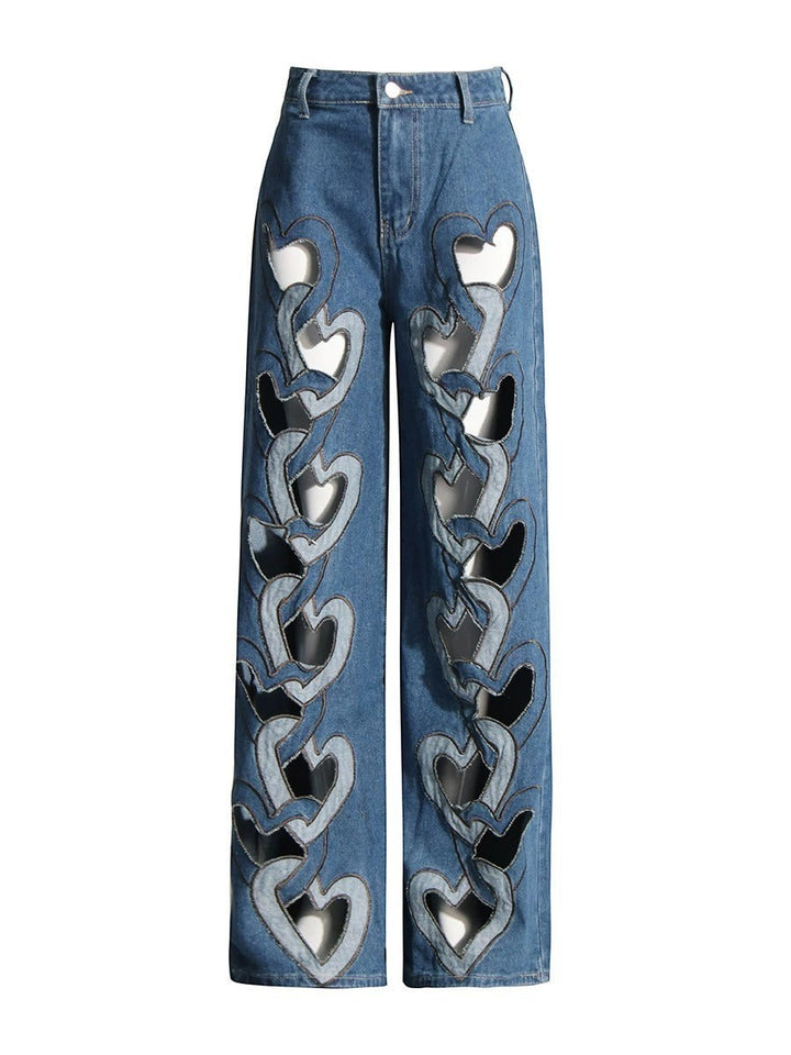 Sea Dragon Dreams high-waisted blue denim jeans with a wide-leg fit and repeating heart-shaped cutout details.