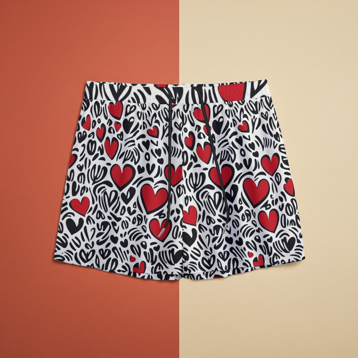 Sea Dragon Dreams men's swim shorts featuring a colorful red heart pattern on a white and black abstract background.