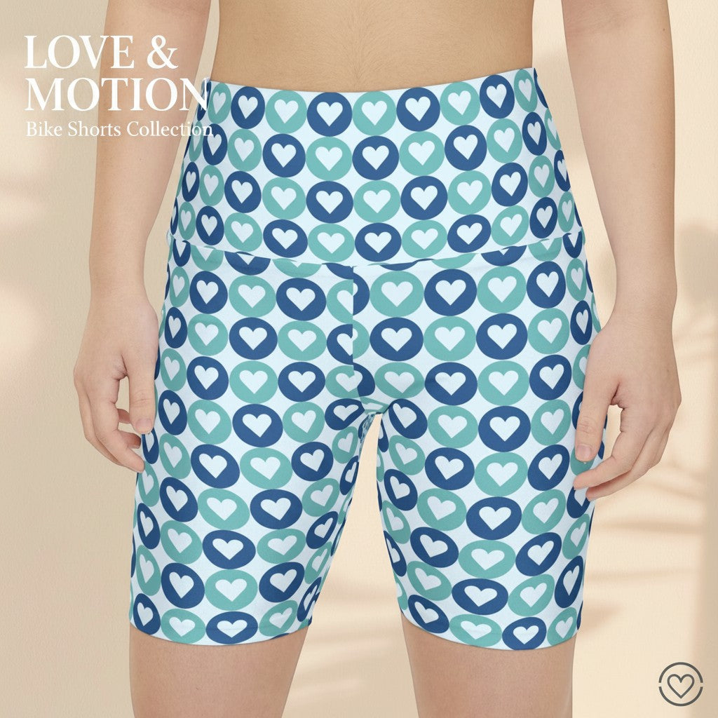 Sea Dragon Dreams women's workout bike shorts featuring a blue and teal heart pattern on lightweight polyester fabric.