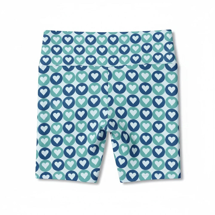 Sea Dragon Dreams women's workout shorts in polyester with a blue and teal heart pattern and comfortable elastic waist.