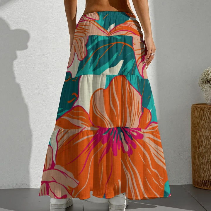 Sea Dragon Dreams pleated maxi skirt with vibrant orange and teal hibiscus floral print, back view