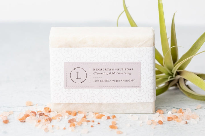 Sea Dragon Dreams Himalayan salt soap bar with natural ingredients, vegan and non-GMO, displayed with salt crystals.