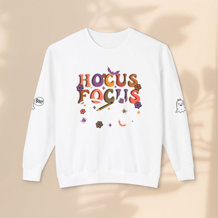 Sea Dragon Dreams white crewneck sweatshirt with Hocus Focus Teacher graphic, ghost and spider motifs on sleeves.