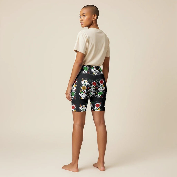 Sea Dragon Dreams women's workout shorts with a festive holiday pickleball print on black moisture-wicking fabric.