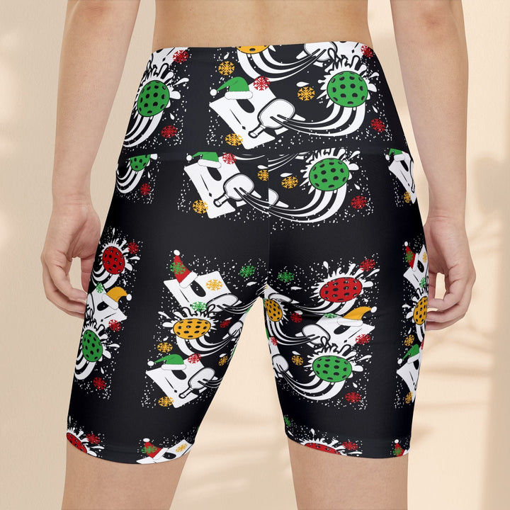 Sea Dragon Dreams women's black workout shorts with a festive holiday pickleball print and moisture-wicking fabric.