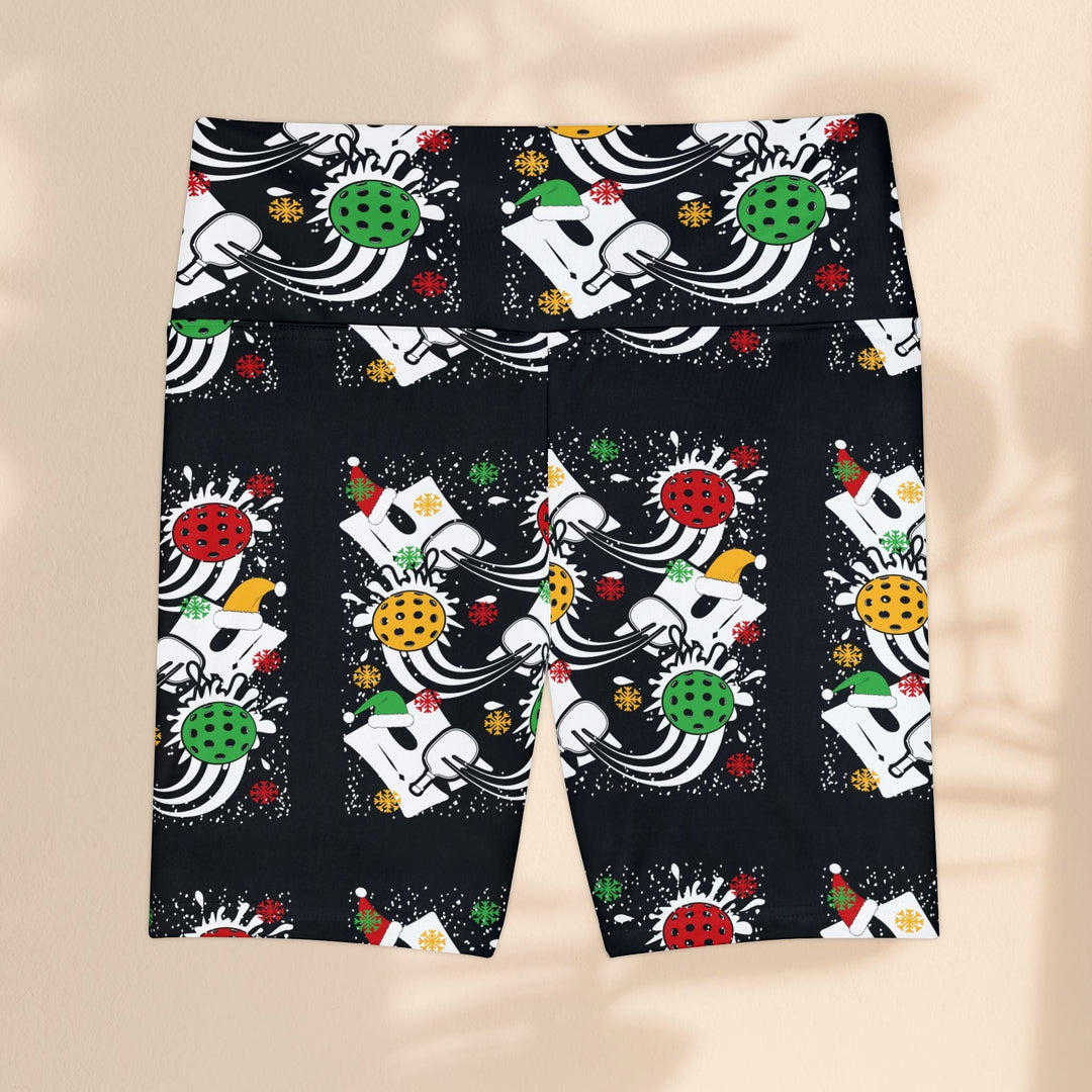 Sea Dragon Dreams women's workout shorts with a festive holiday pickleball print on black moisture-wicking polyester.