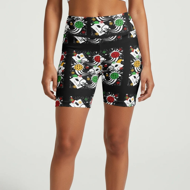 Sea Dragon Dreams women's black workout shorts featuring a festive holiday pickleball pattern with Santa hats