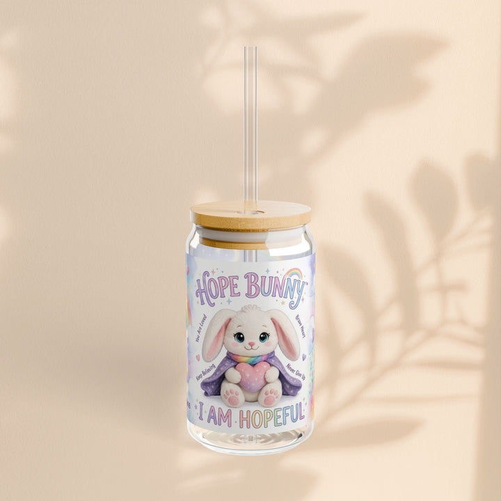 Sea Dragon Dreams 16oz sipper glass featuring Hope Bunny with pastel rainbow design and I Am Hopeful text with straw.