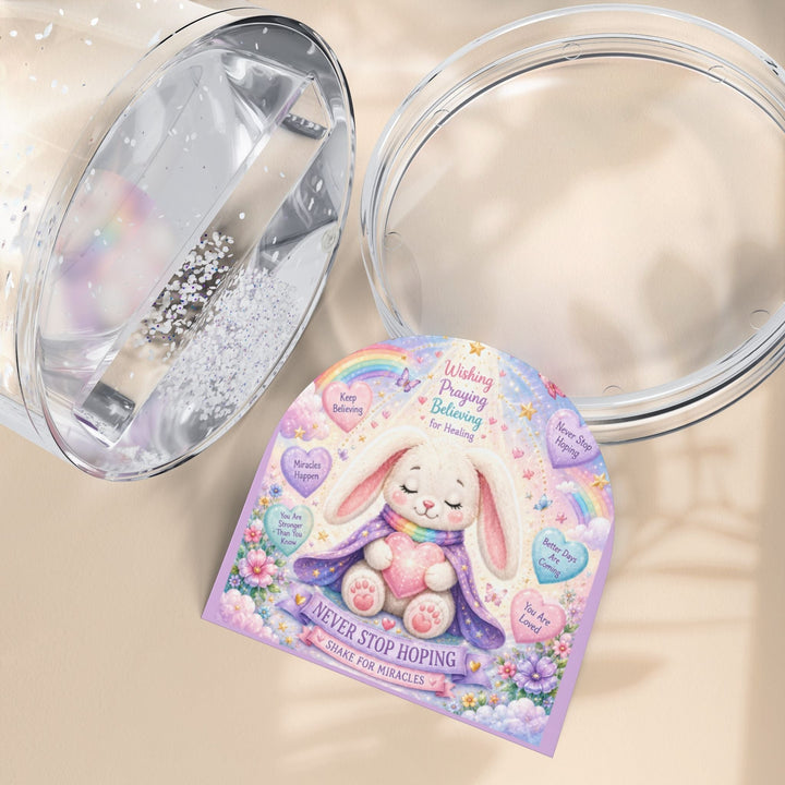 Sea Dragon Dreams Brave Buddies Hope Bunny snow globe featuring a cute rabbit with inspirational messages and glitter.