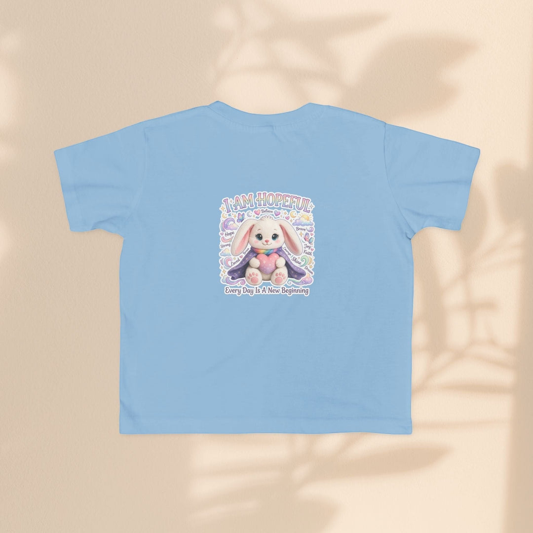 Sea Dragon Dreams light blue toddler tee featuring the Brave Buddies Hope Bunny graphic and I Am Hopeful text.