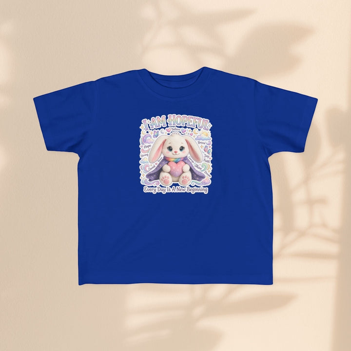 Sea Dragon Dreams toddler tee in blue cotton featuring a cute Hope Bunny graphic with the text I Am Hopeful.