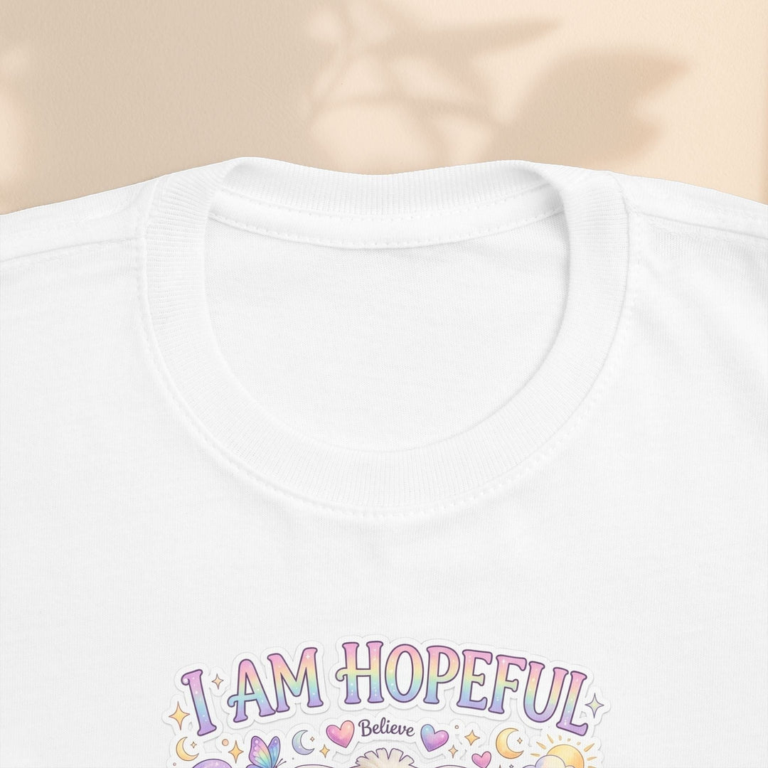 Sea Dragon Dreams toddler tee featuring Hope Bunny graphic with I Am Hopeful text in pastel colors on white cotton