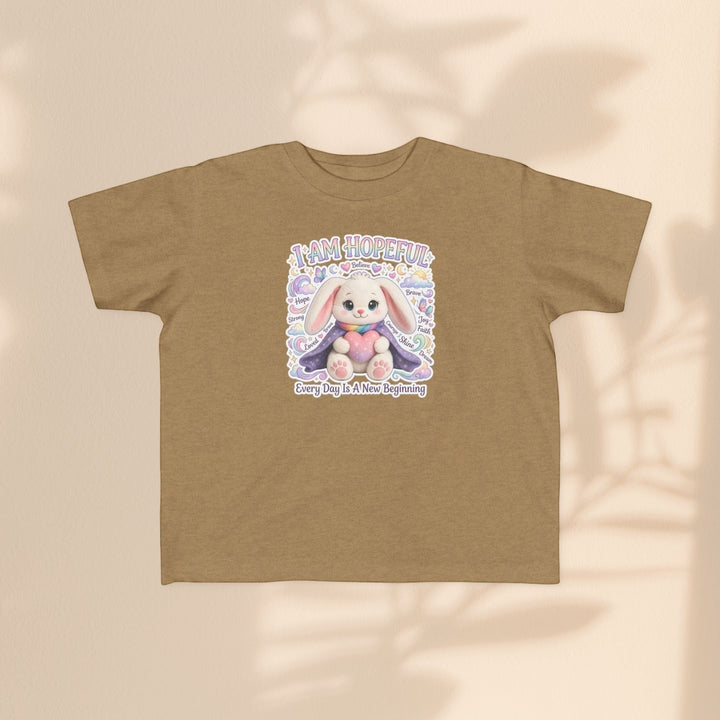 Sea Dragon Dreams toddler tee in tan cotton featuring the Brave Buddies Hope Bunny with I Am Hopeful text.
