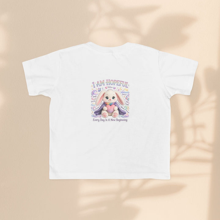 Sea Dragon Dreams white cotton toddler tee featuring a Hope Bunny graphic with the text I Am Hopeful.