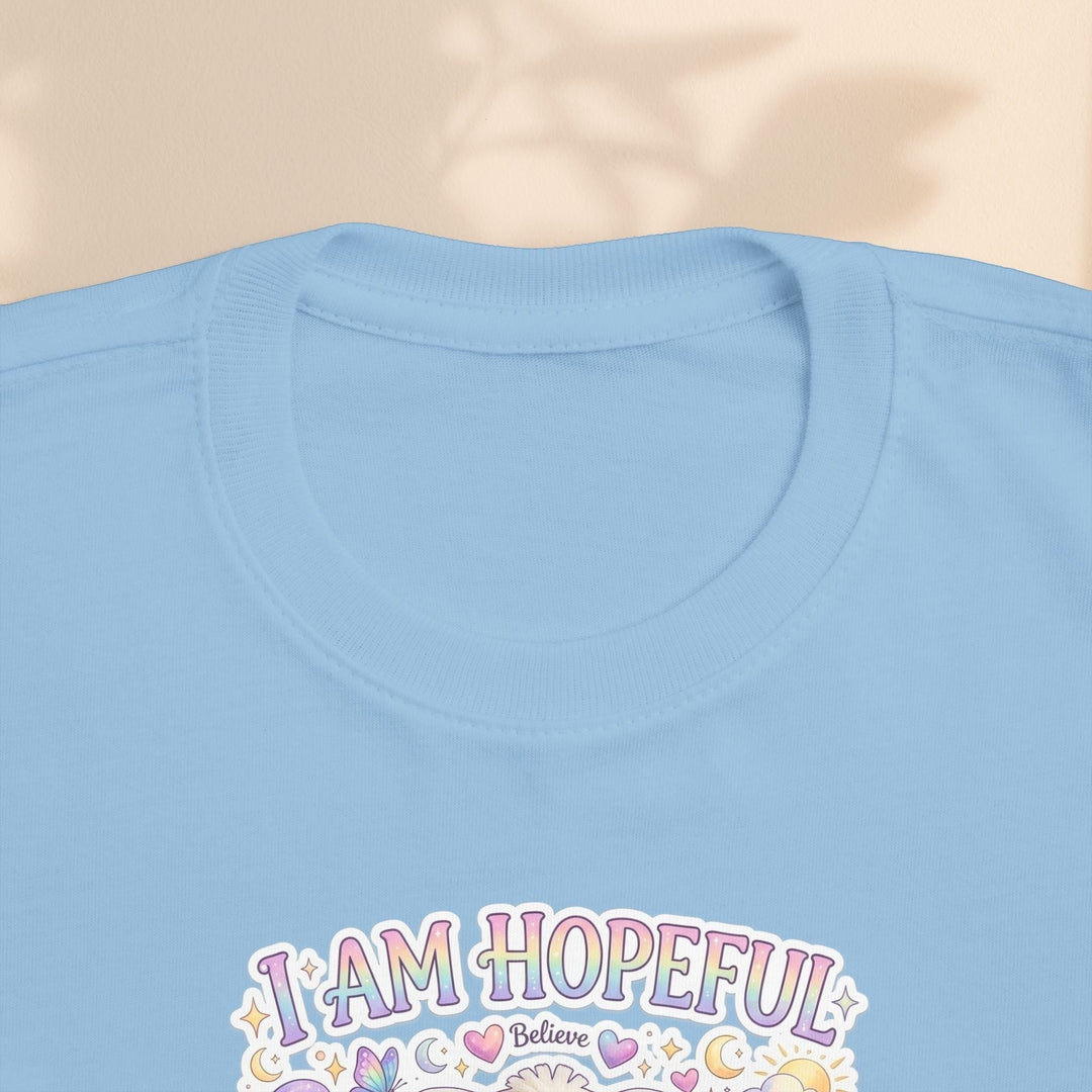 Sea Dragon Dreams light blue toddler t-shirt featuring the Hope Bunny I Am Hopeful graphic with pastel accents