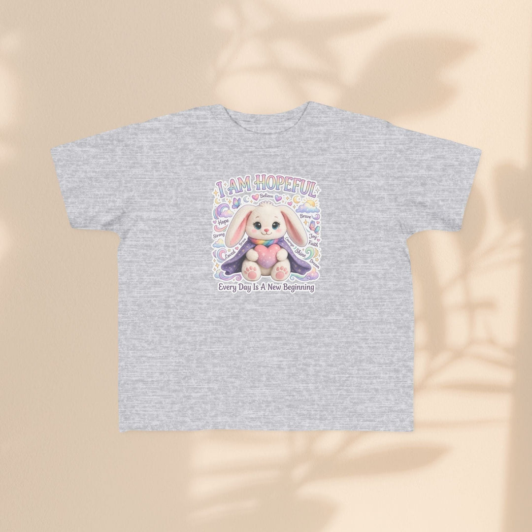 Sea Dragon Dreams toddler tee in heather grey cotton featuring a cute Hope Bunny graphic and I Am Hopeful text.