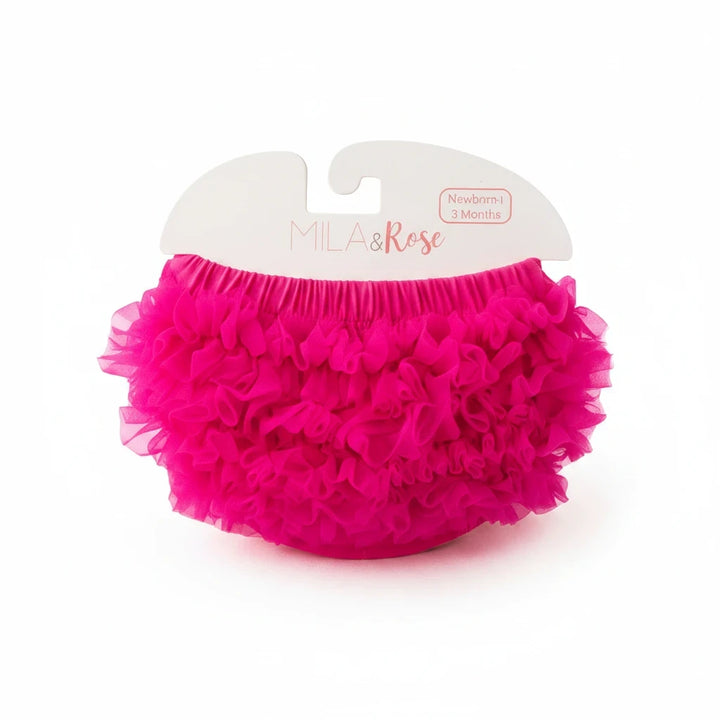 Sea Dragon Dreams hot pink baby bloomer with layered ruffles on the back and elastic waistband on a display card.