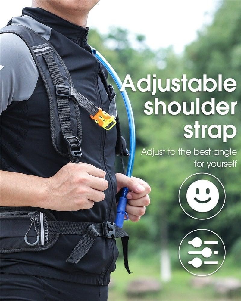Sea Dragon Dreams 10L hydration backpack with adjustable shoulder straps and blue drinking tube on a cyclist