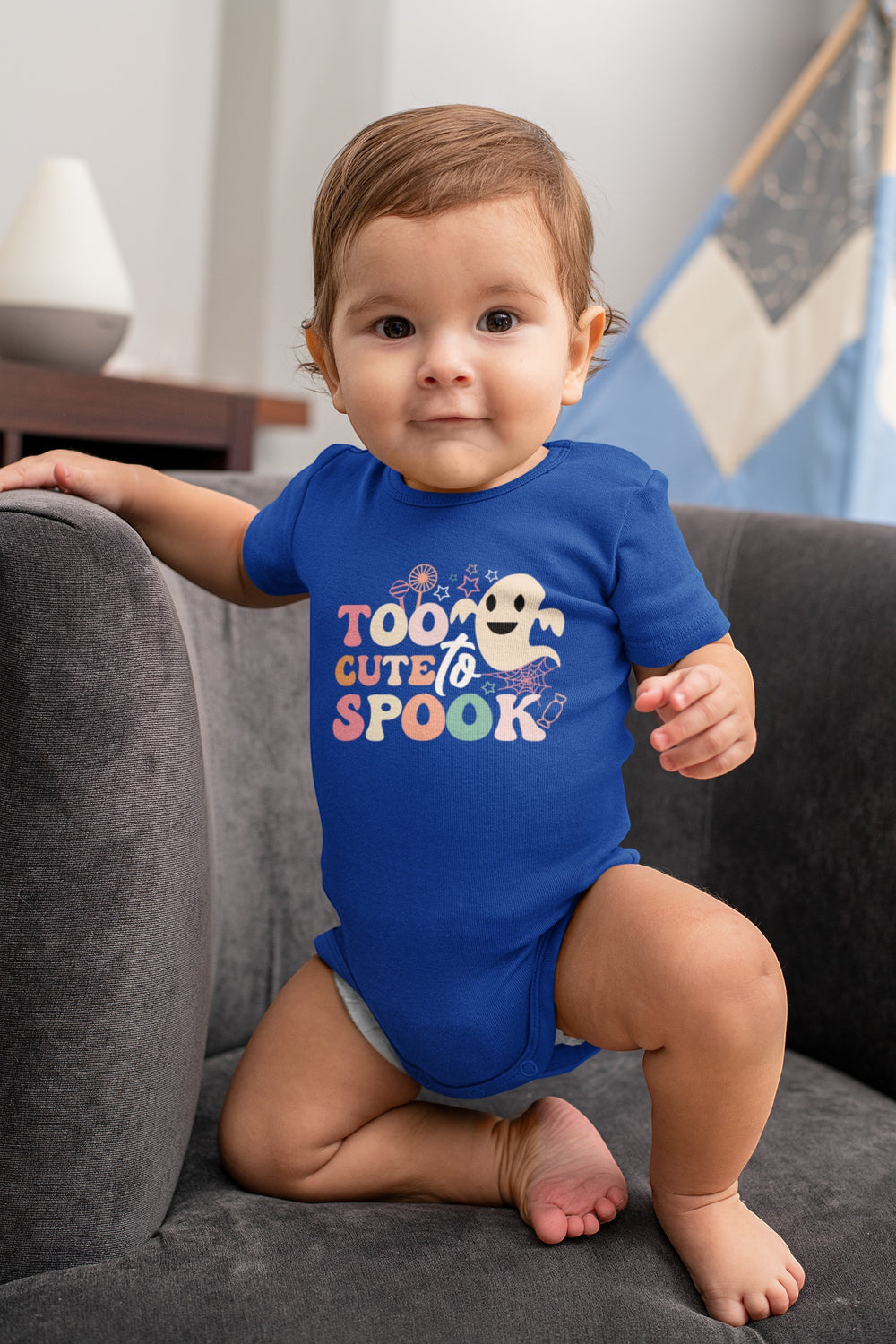 Sea Dragon Dreams infant blue bodysuit featuring a cute ghost graphic and Too Cute To Spook text for Halloween.