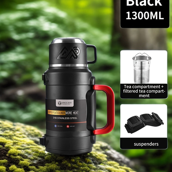 Sea Dragon Dreams black stainless steel insulated water bottle with handle, tea filter, and carrying strap.