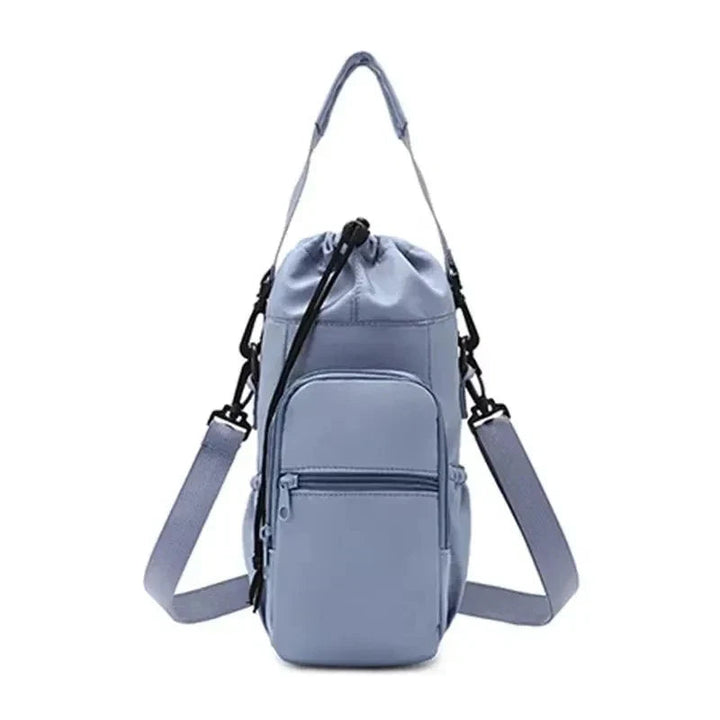 Sea Dragon Dreams light blue insulated water bottle carrier bag with adjustable strap and front phone pocket