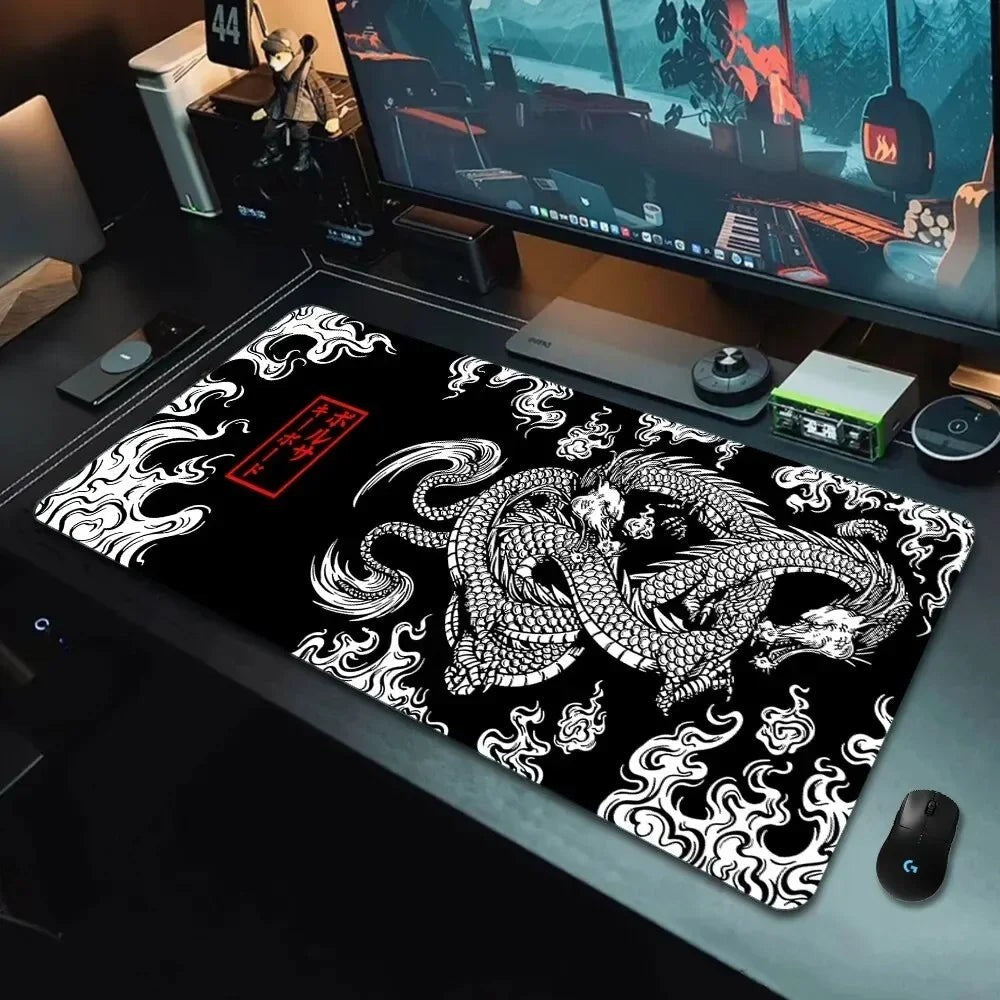 Sea Dragon Dreams XXL gaming mouse pad with black and white Japanese dragon art on a desk setup.