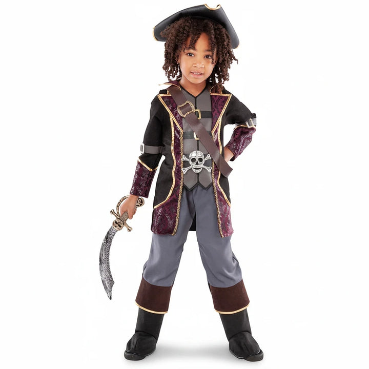 Child wearing a Sea Dragon Dreams pirate captain costume with a black jacket, skull buckle, and toy sword.