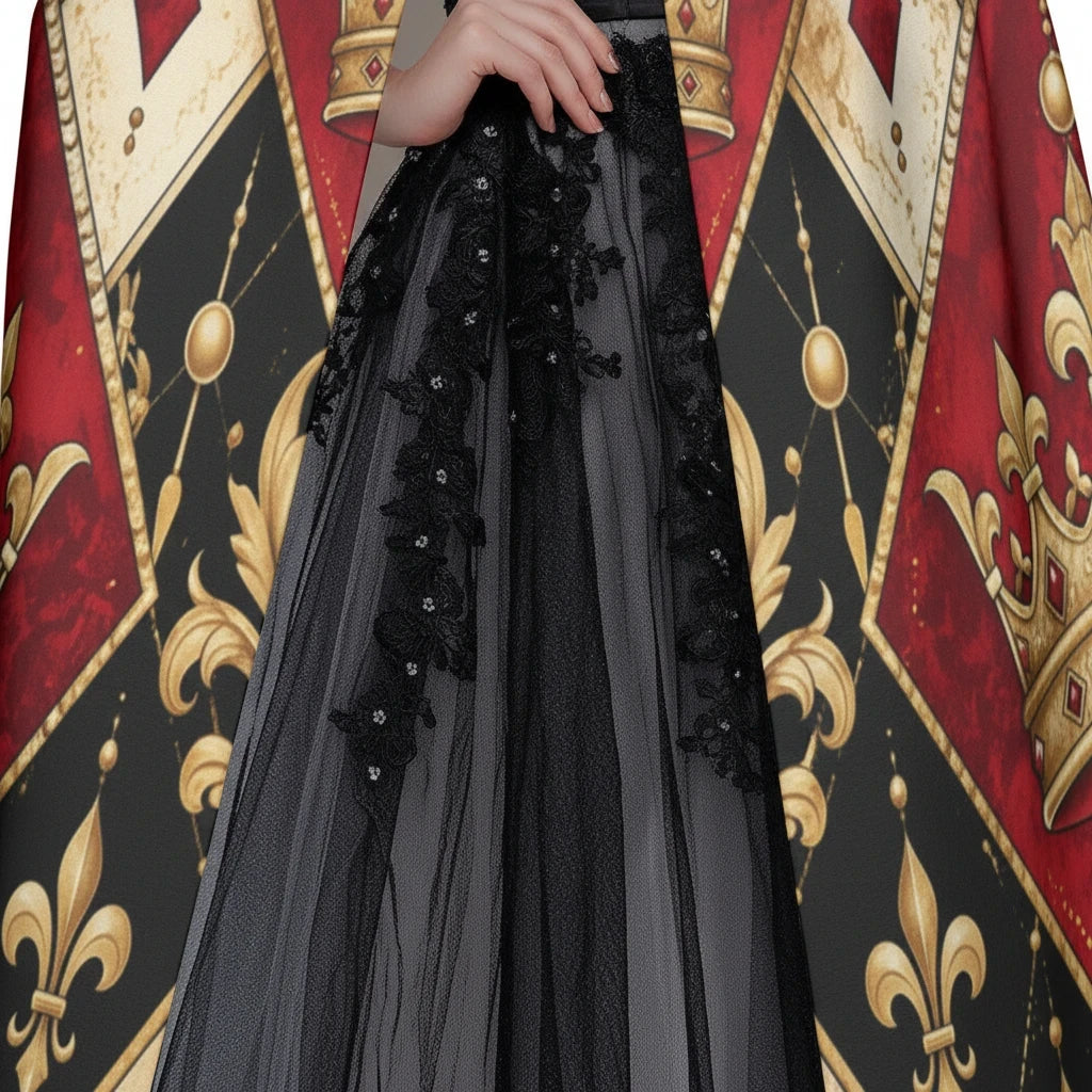 Sea Dragon Dreams King of Hearts hooded cloak featuring a red, black, and gold royal playing card print pattern.