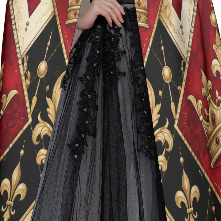 Sea Dragon Dreams King of Hearts hooded cloak featuring a red, black, and gold royal playing card print pattern.