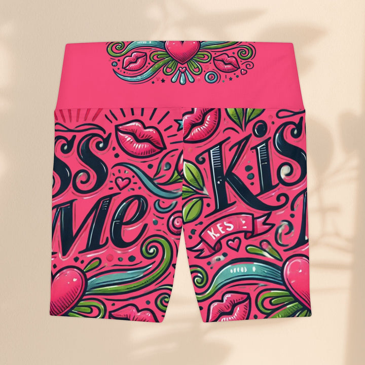 Sea Dragon Dreams high-waisted workout shorts in pink with a playful Kiss Me lip and heart graphic print.