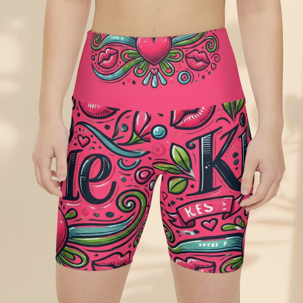 Sea Dragon Dreams high-waisted workout shorts in pink with a playful Kiss Me lip and heart graphic print.