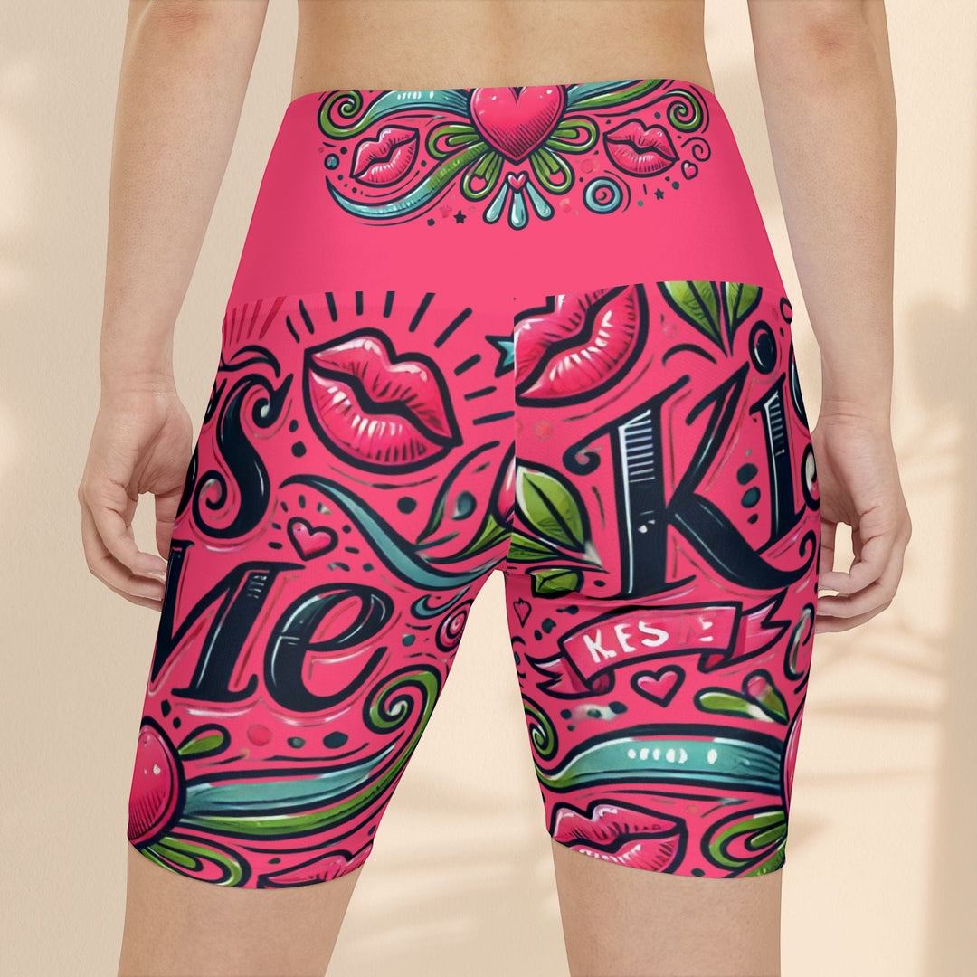 Sea Dragon Dreams high-waisted workout shorts in pink with a playful Kiss Me lip and heart graphic print