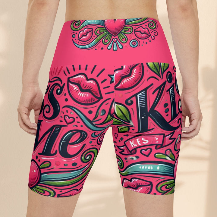 Sea Dragon Dreams high-waisted workout shorts in pink with a playful Kiss Me lip and heart graphic print