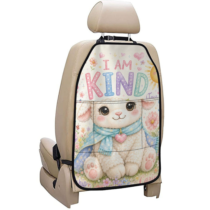 Sea Dragon Dreams car seat back organizer featuring a cute lamb illustration with the text I AM KIND in pastel colors.