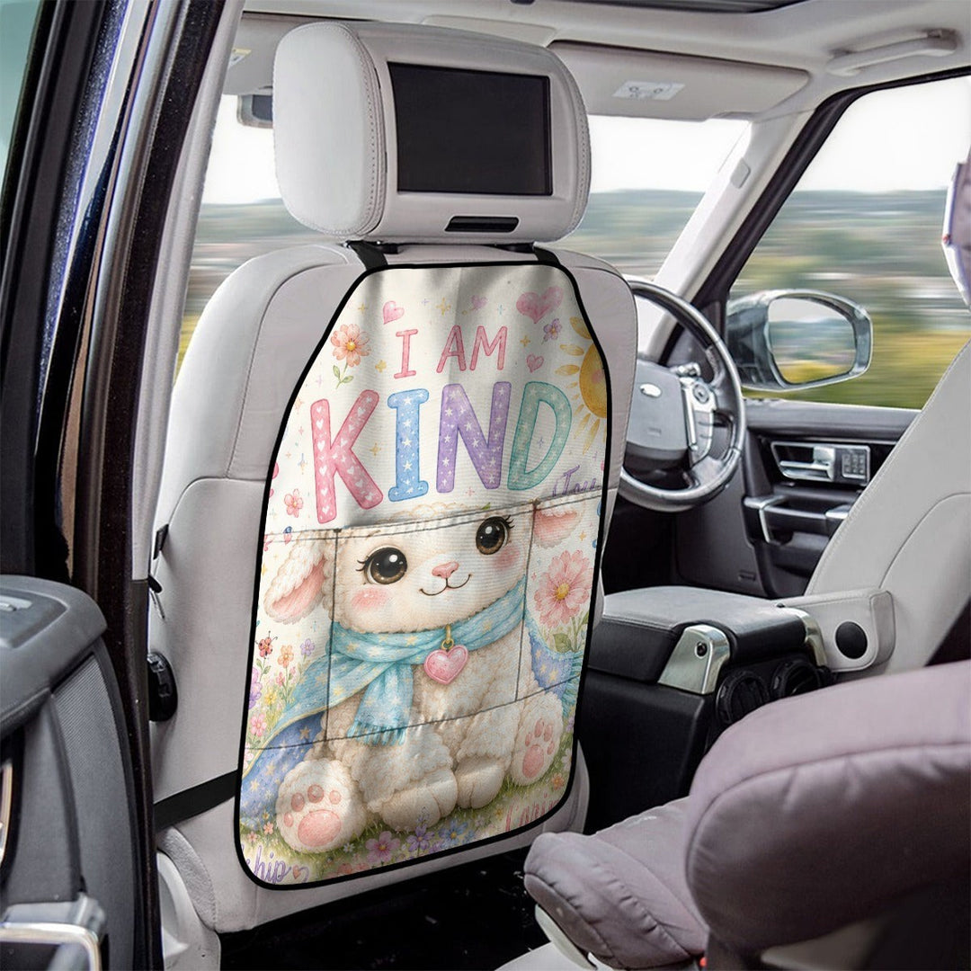 Sea Dragon Dreams car seat back storage bag with a cute lamb illustration and I AM KIND text in a black frame
