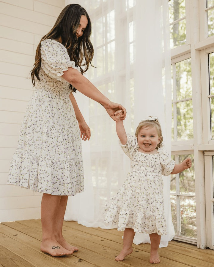 Sea Dragon Dreams mommy and me Katherine dresses in lavender floral print with puff sleeves and flowy silhouettes.
