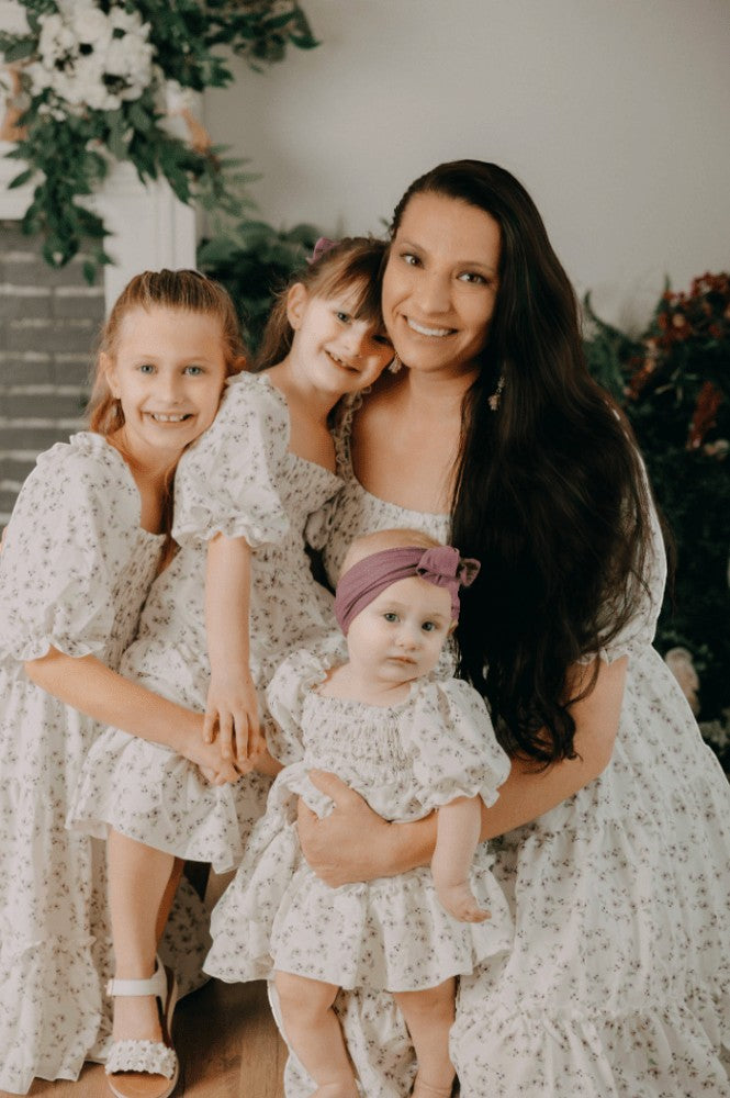 Sea Dragon Dreams matching lavender floral Katherine dresses worn by a mother and her three daughters