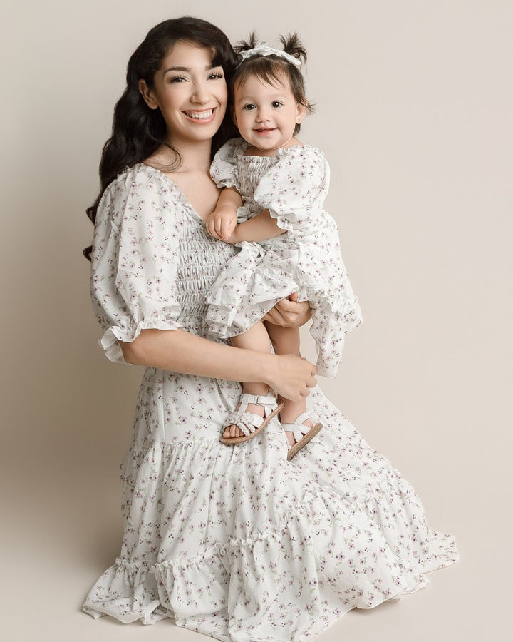 Sea Dragon Dreams mommy and me matching lavender floral dresses with puff sleeves on a mother and her young daughter