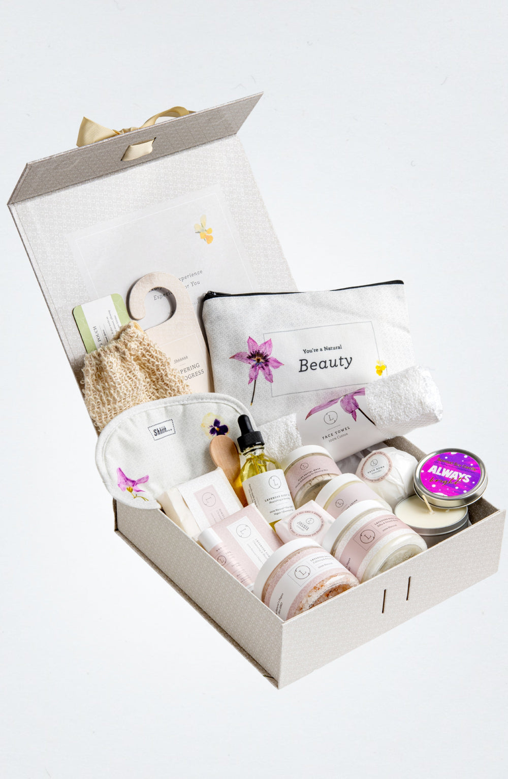 Sea Dragon Dreams lavender spa gift basket featuring natural bath products, body scrub, essential oils, and a face mask.