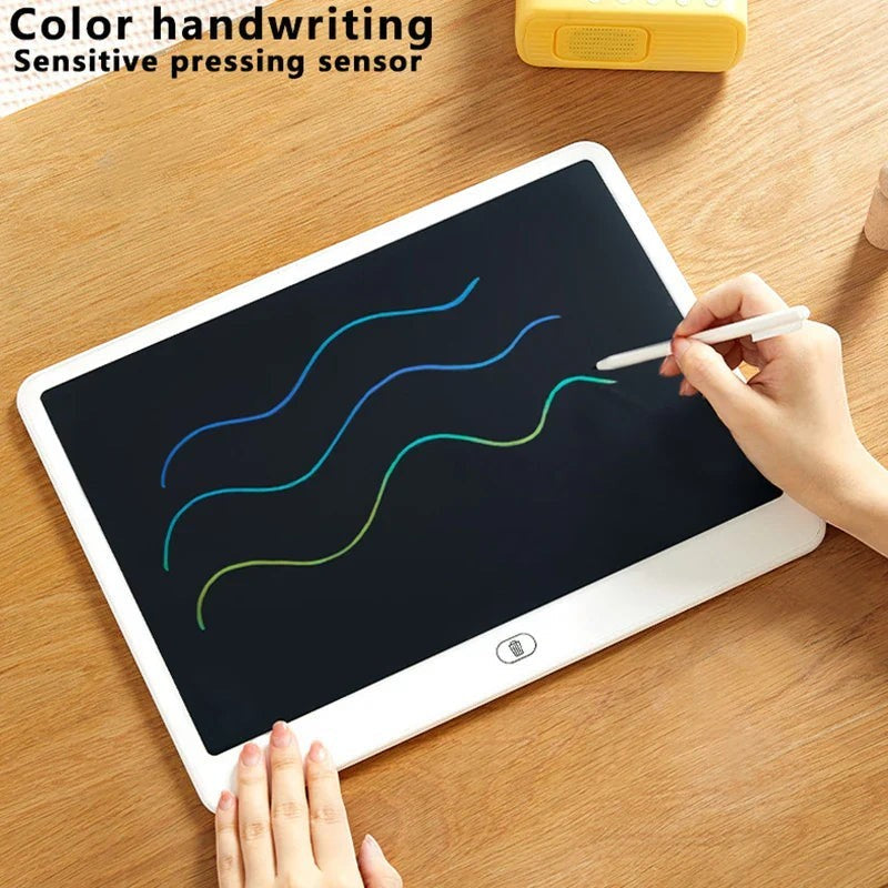 Sea Dragon Dreams LCD writing tablet with white frame and stylus drawing colorful wavy lines on a wooden desk