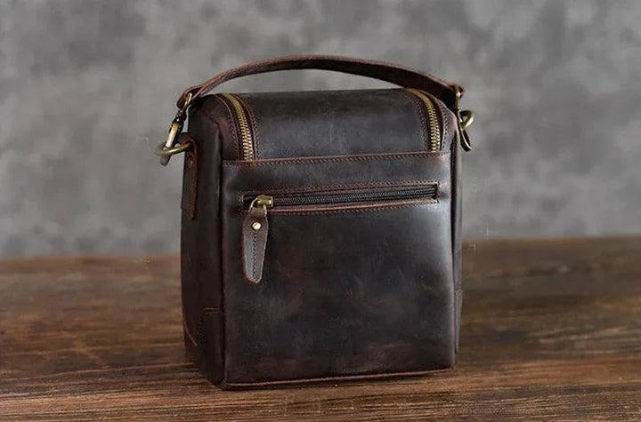 Sea Dragon Dreams The Calista handcrafted dark brown full-grain leather camera bag with brass hardware and zipper pocket