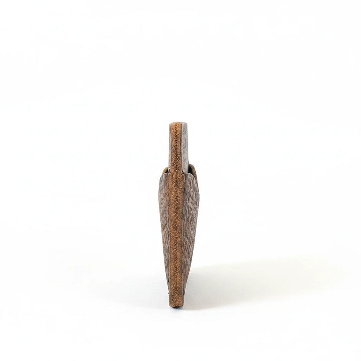 Sea Dragon Dreams Portland Leather Card Case in brown top-grain bovine leather, shown from a slim side profile.