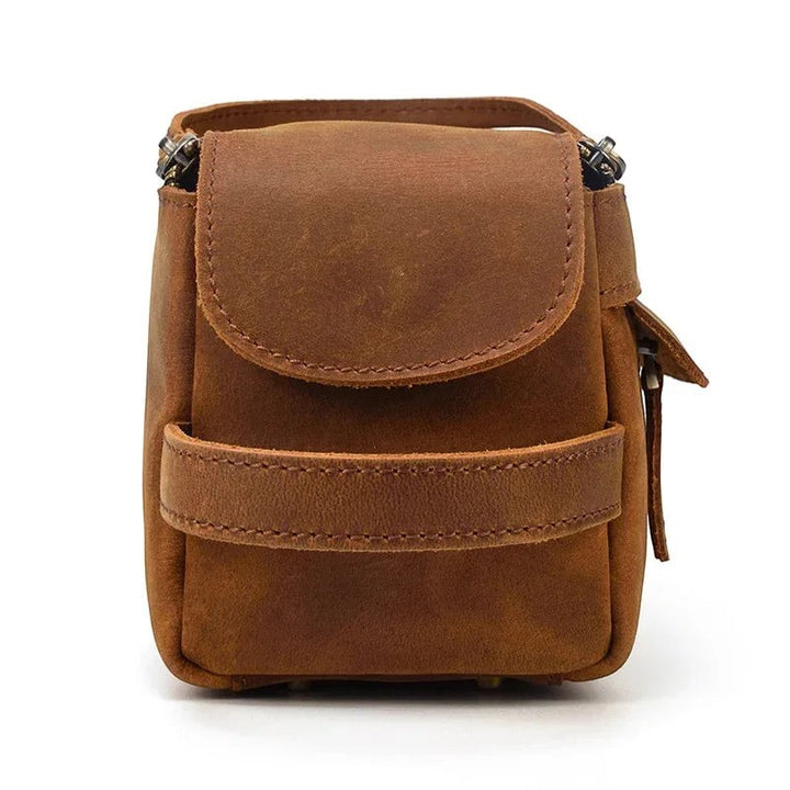 Sea Dragon Dreams handmade brown leather toiletry bag with a front pocket and durable design for travel