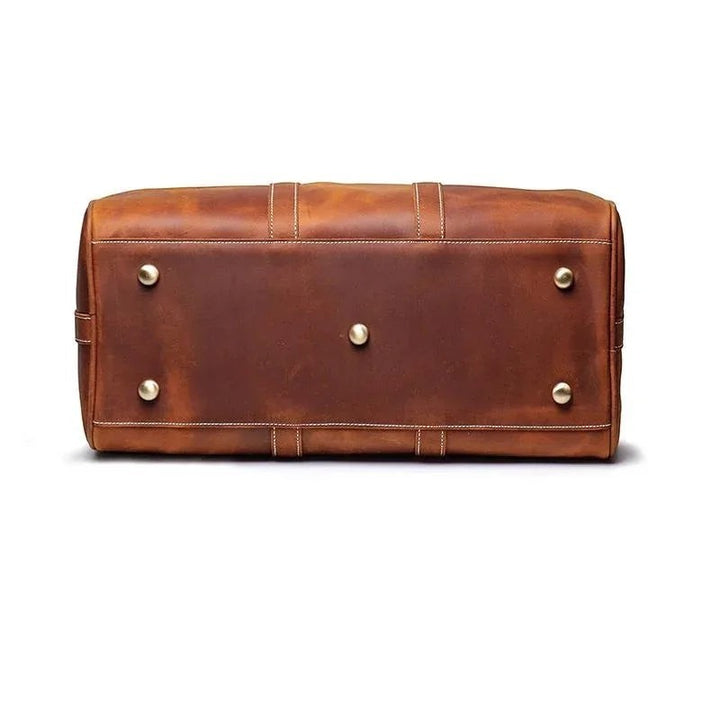 Sea Dragon Dreams Brandt Weekender brown horse leather duffle bag base with protective metal feet