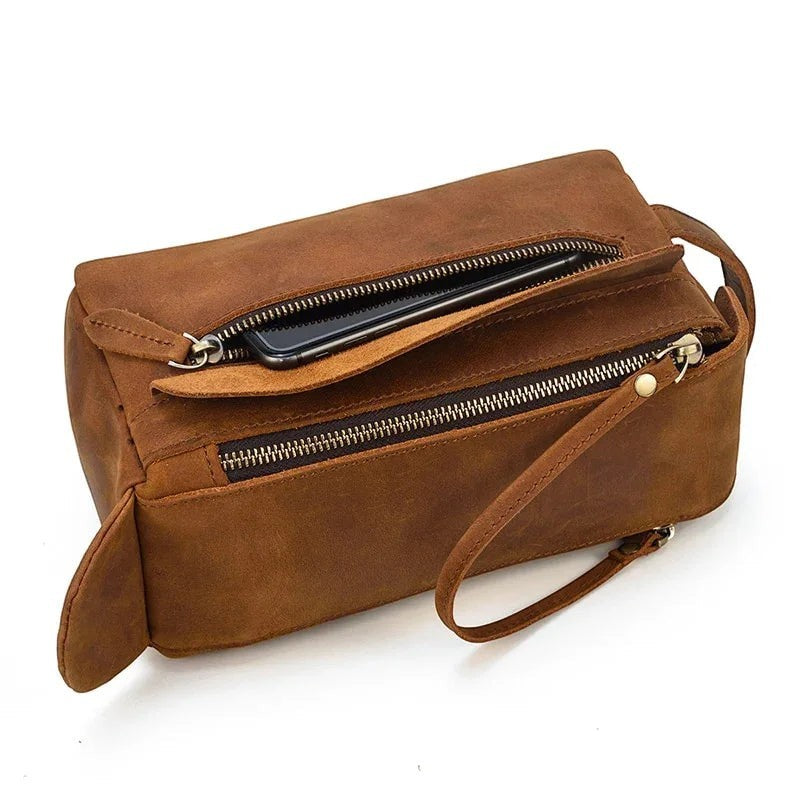Sea Dragon Dreams handmade brown leather toiletry bag with zippered front pocket and side carry strap