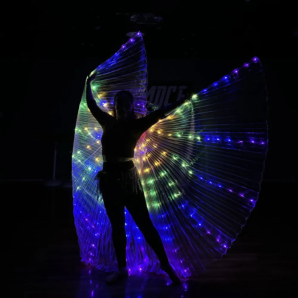Sea Dragon Dreams LED butterfly dance wings with colorful glowing lights, worn by a dancer in a dark studio setting.