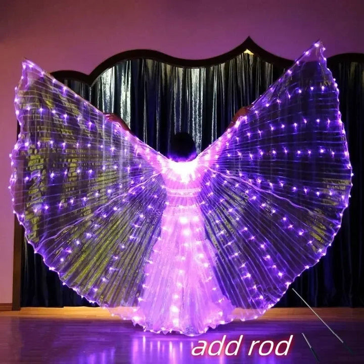 Sea Dragon Dreams LED butterfly dance wings in purple, worn by a performer to create a glowing, dramatic silhouette.